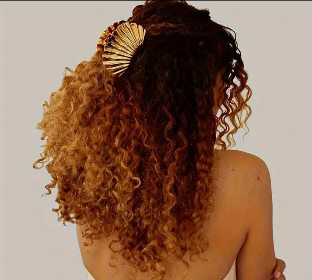 $9.990 Set de 2 Pinzas de pelo con diseño de concha marina – Elegancia atemporal y veraniega