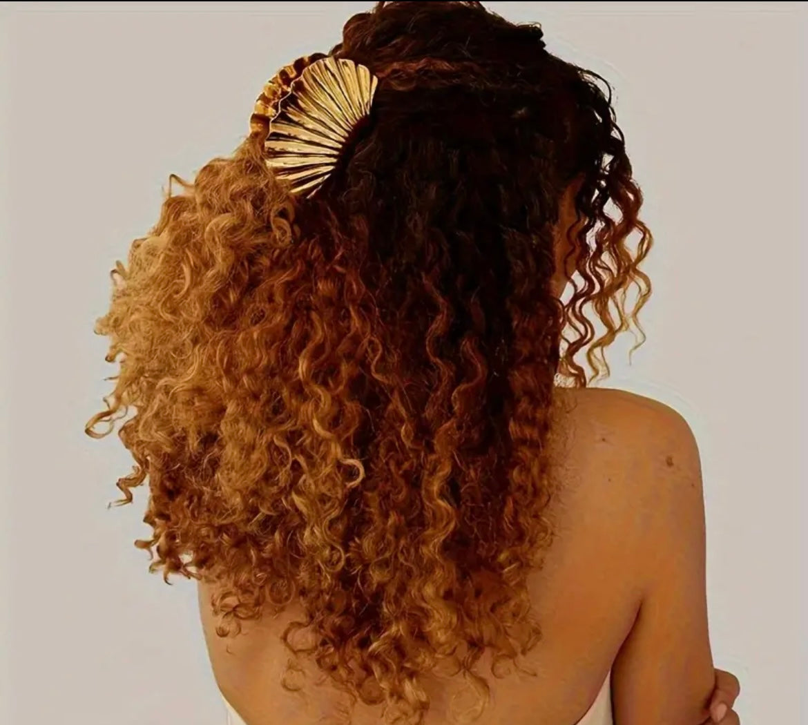 $9.990 Set de 2 Pinzas de pelo con diseño de concha marina – Elegancia atemporal y veraniega