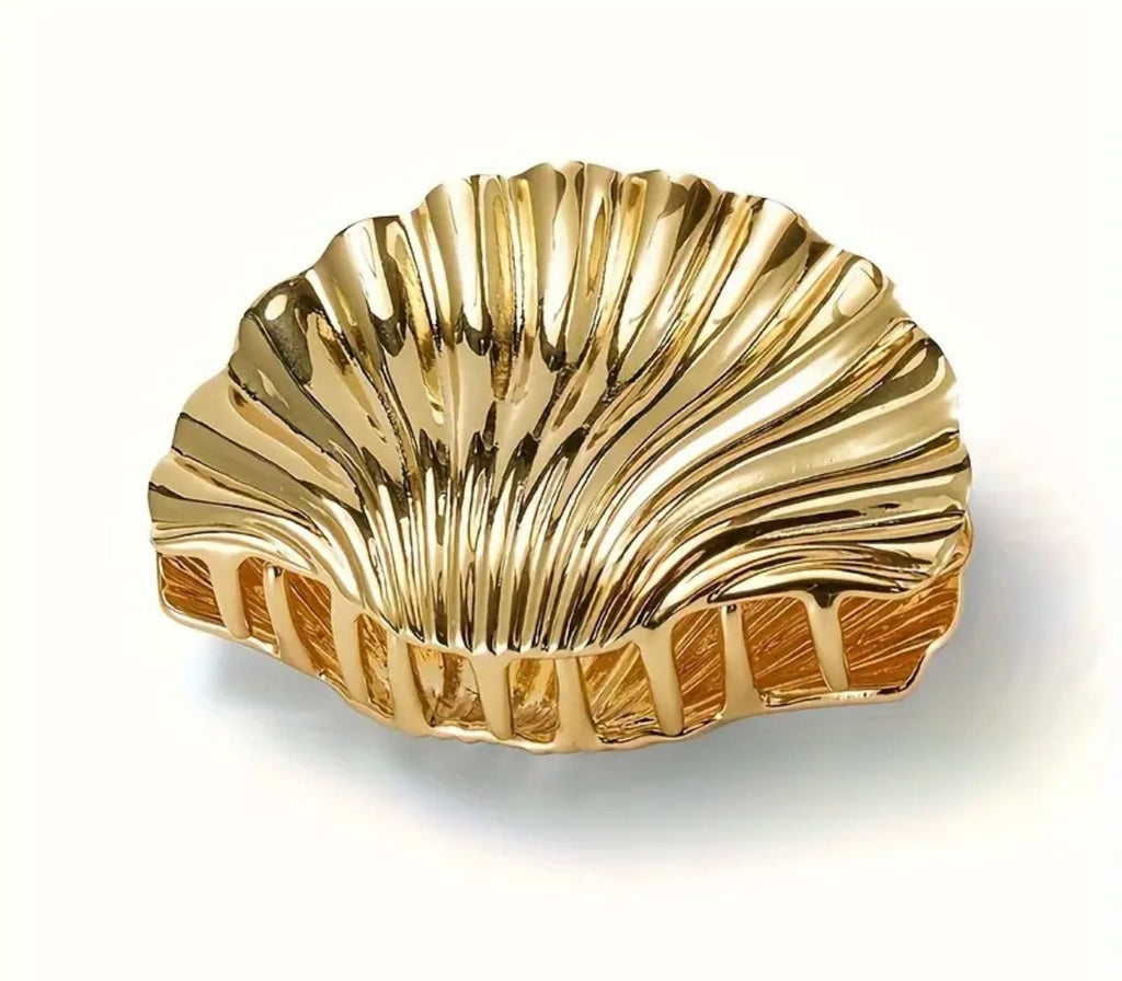 $9.990 Set de 2 Pinzas de pelo con diseño de concha marina – Elegancia atemporal y veraniega