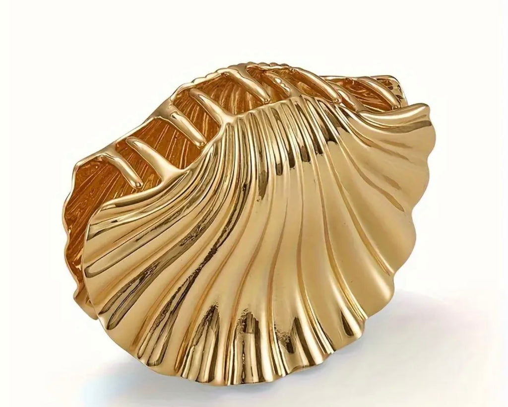 $9.990 Set de 2 Pinzas de pelo con diseño de concha marina – Elegancia atemporal y veraniega