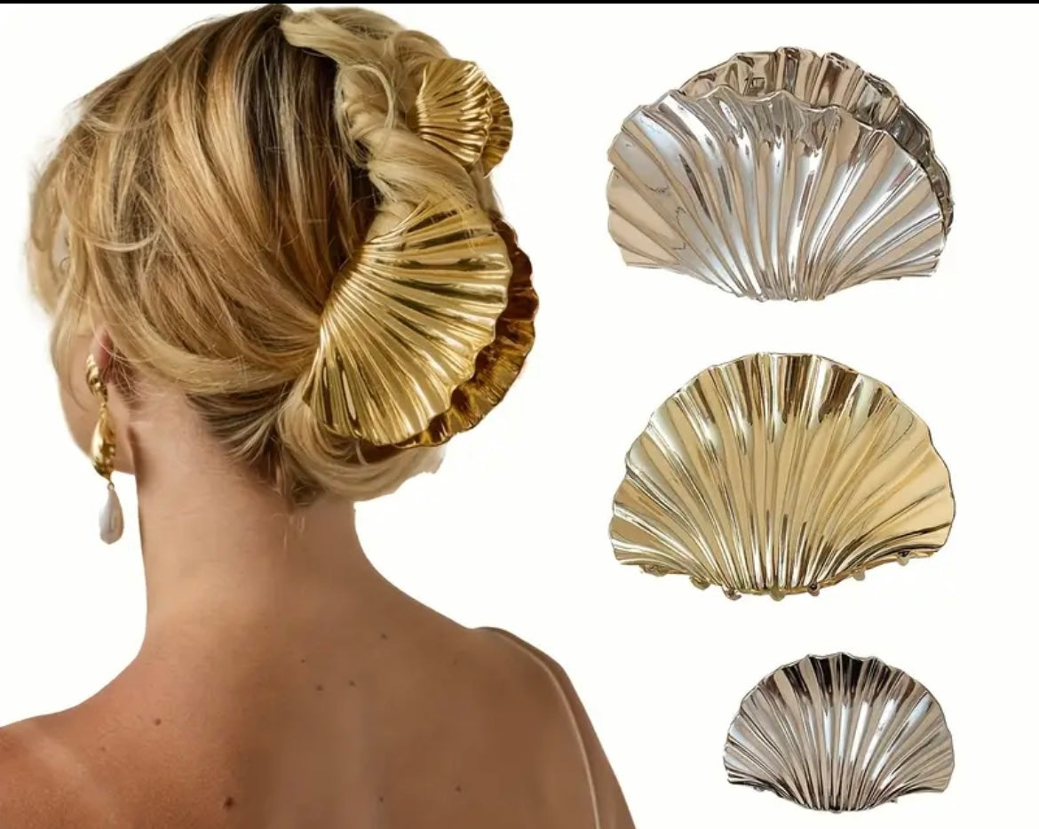 $9.990 Set de 2 Pinzas de pelo con diseño de concha marina – Elegancia atemporal y veraniega