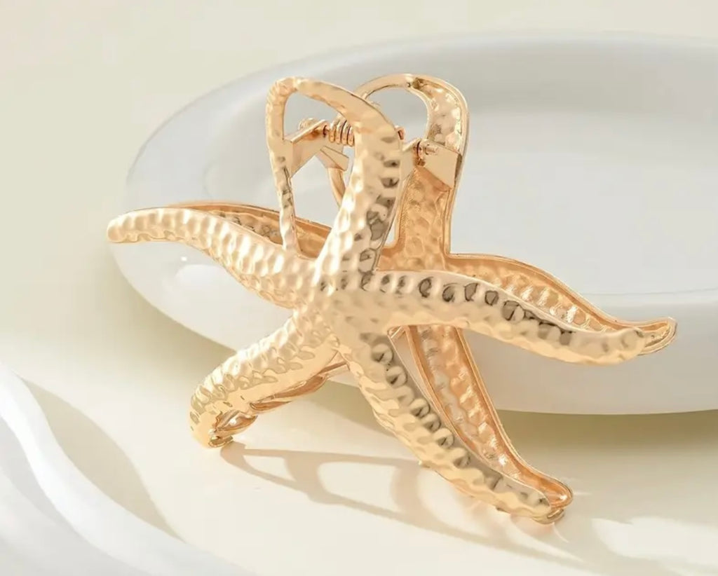 $9.990 Pinza de Pelo Estrella de Mar Dorada o Plateada 🌊 ⭐️ – Summer Collection
