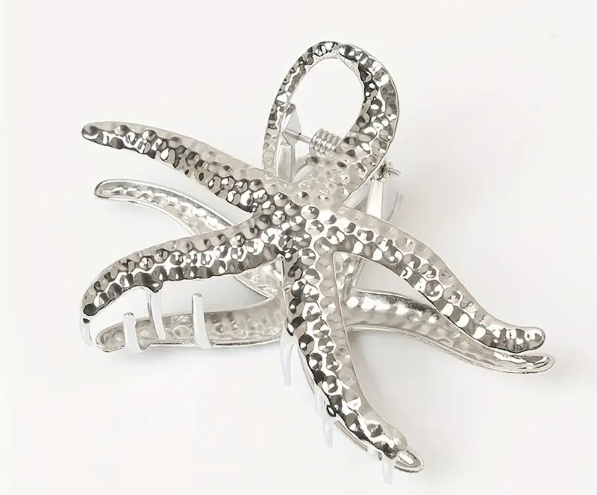 $9.990 Pinza de Pelo Estrella de Mar Dorada o Plateada 🌊 ⭐️ – Summer Collection